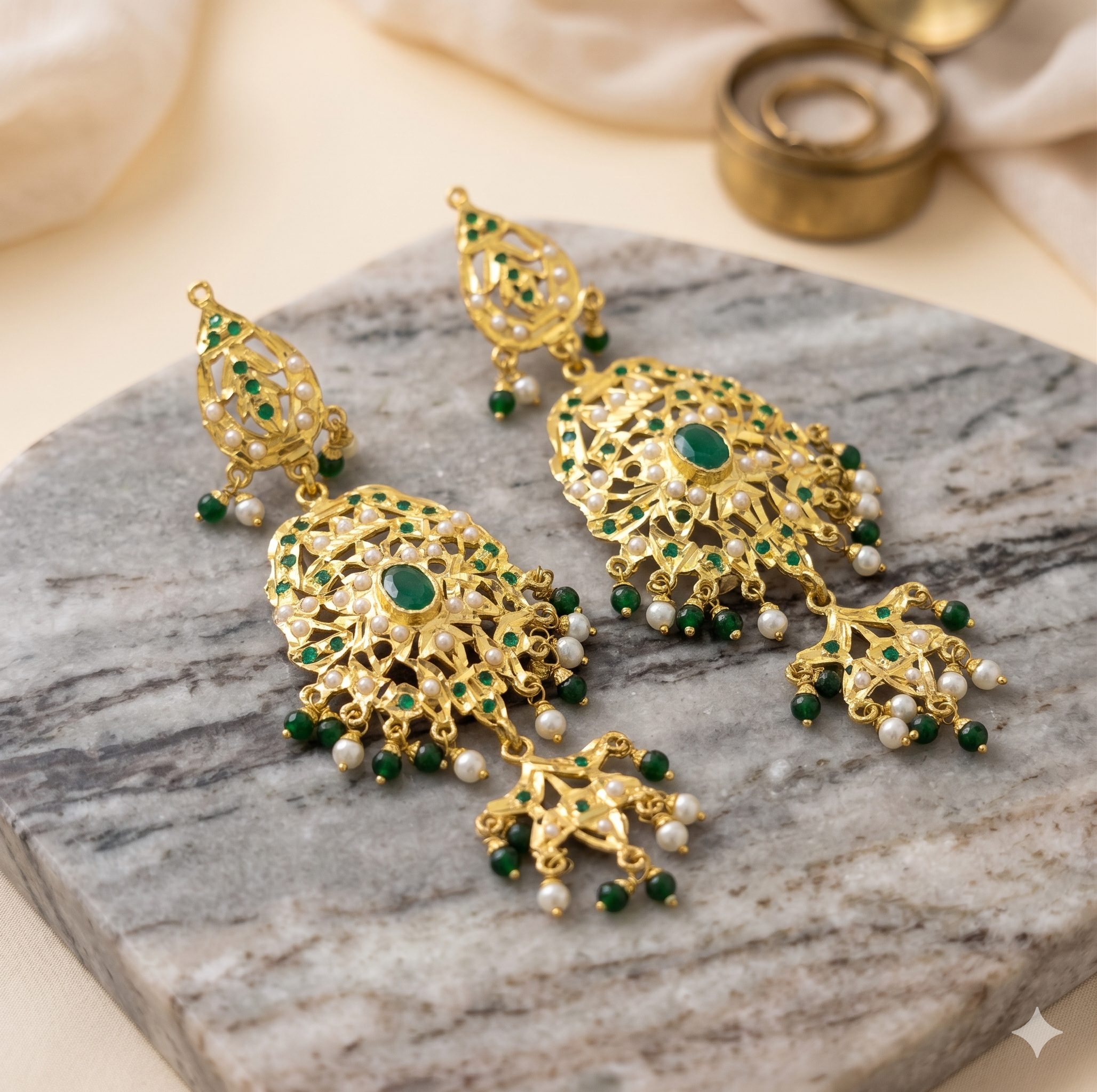 Traditional Gold-Finished Chandbali Earrings with Green Stones and Pearl Droplets