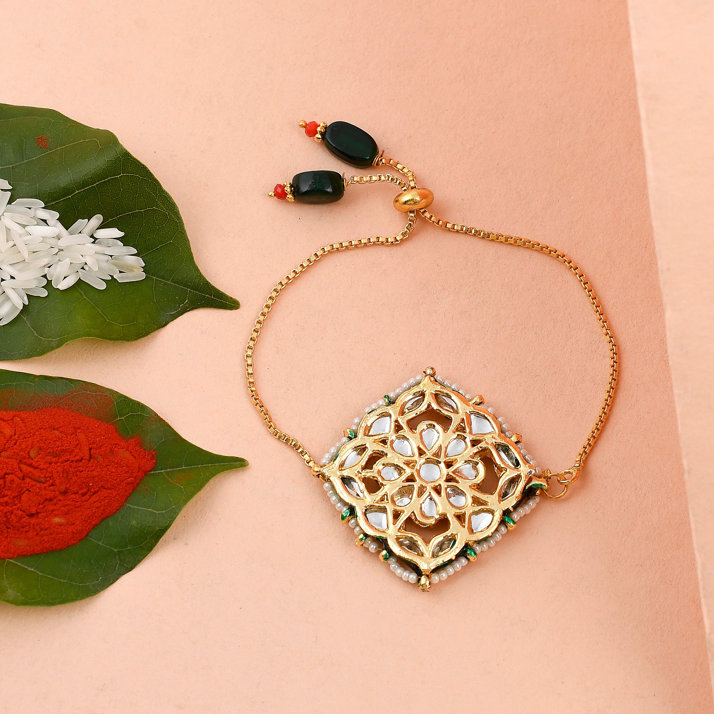 Handcrafted Kundan & Pearl Adjustable Rakhi Bracelet – Premium Festive Gift