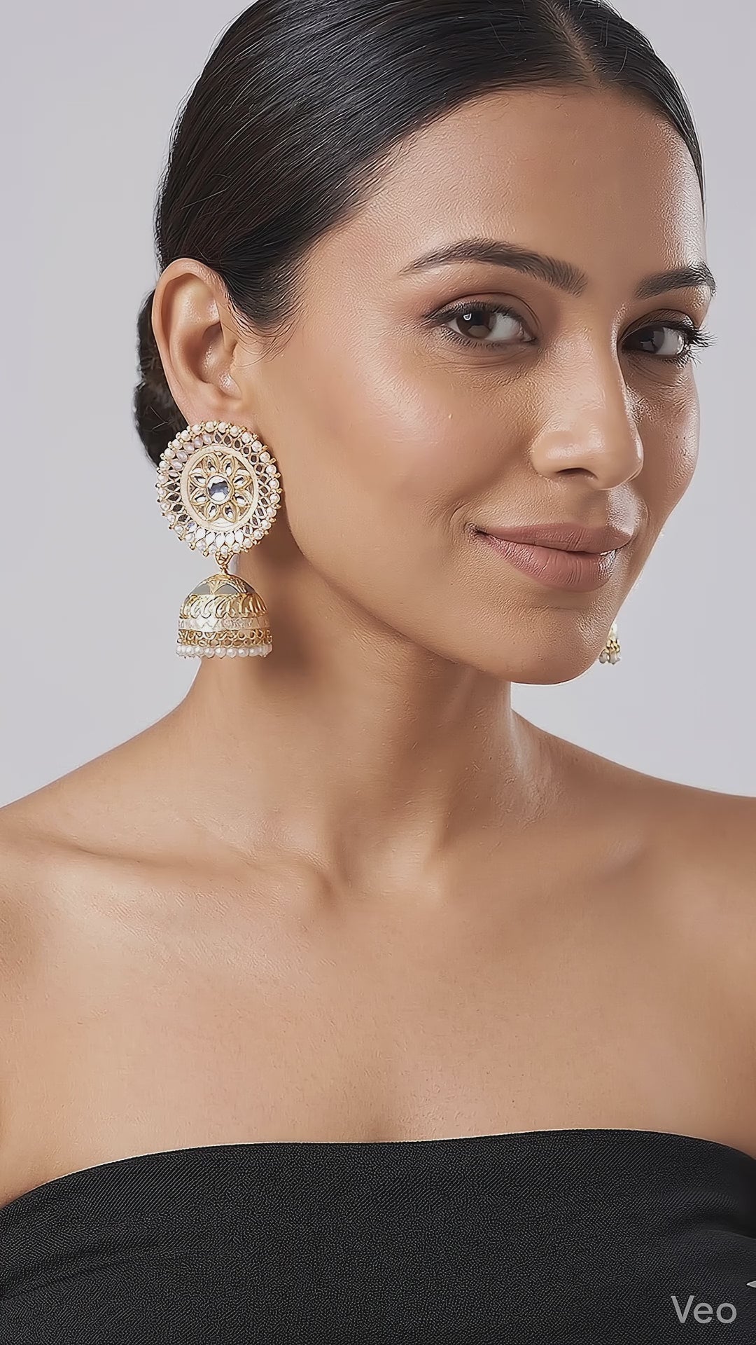 Elegant Gold-Plated Kundan Jhumkas with Pearl Accents and Mirror Work